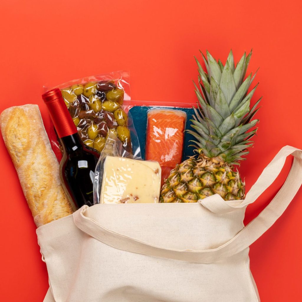 Shopping back with red background Tesco offers and deals